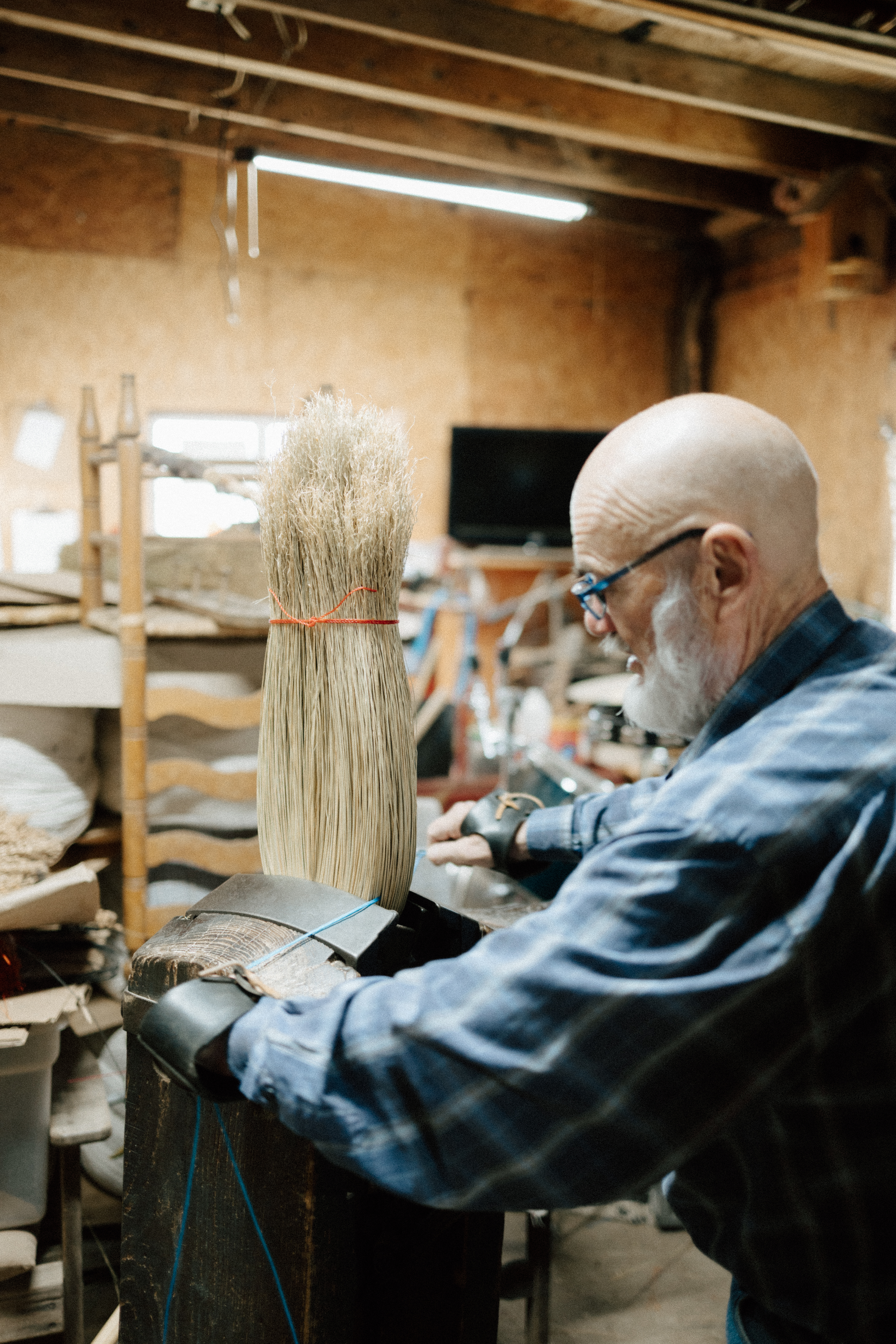 Artisan handcrafting traditional brooms at Hockaday Brooms in McNairy County