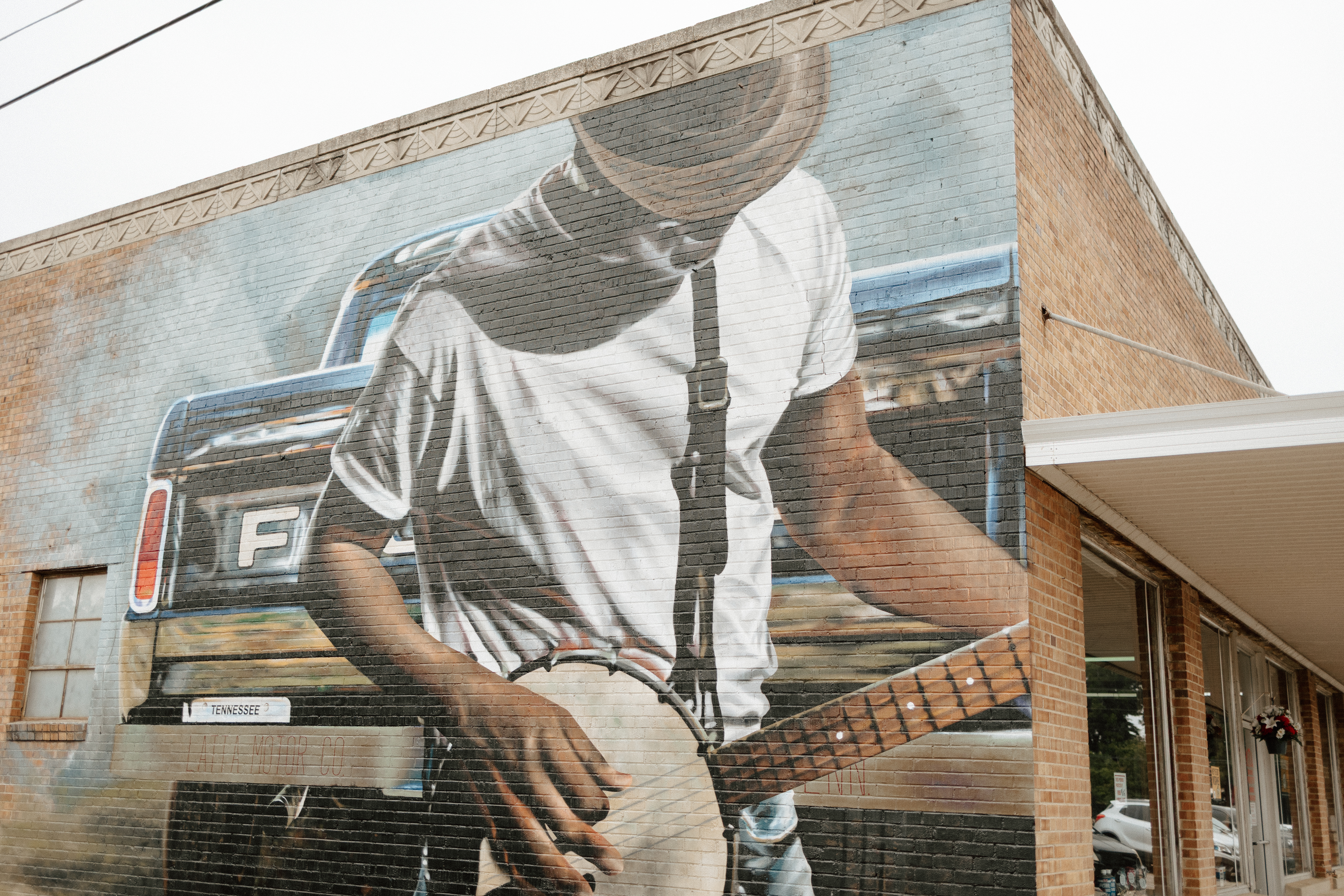 Guitar player mural on a brick building in downtown Selmer, Tennessee